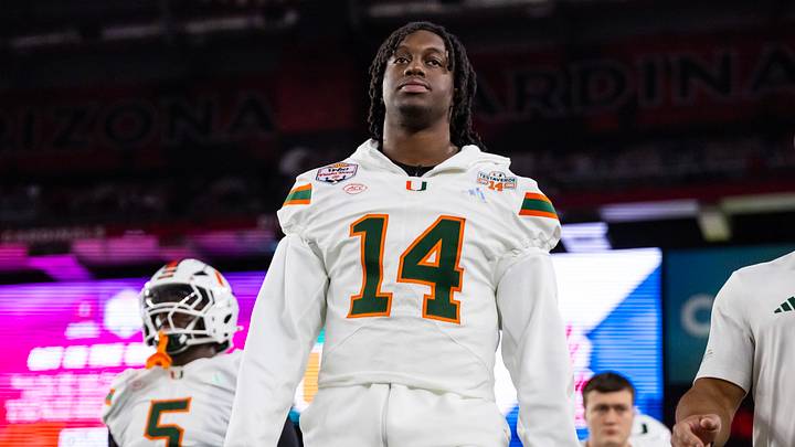 Jan 8, 2026; Glendale, AZ, USA; Miami Hurricanes defensive lineman Hayden Lowe (14) against the Mississippi Rebels during the 2026 Fiesta Bowl and semifinal game of the College Football Playoff at State Farm Stadium. Mandatory Credit: Mark J. Rebilas-Imagn Images Jan 8, 2026; Glendale, AZ, USA; Miami Hurricanes defensive lineman Hayden Lowe (14) against the Mississippi Rebels during the 2026 Fiesta Bowl and semifinal game of the College Football Playoff at State Farm Stadium. Mandatory Credit: Mark J. Rebilas-Imagn Images
