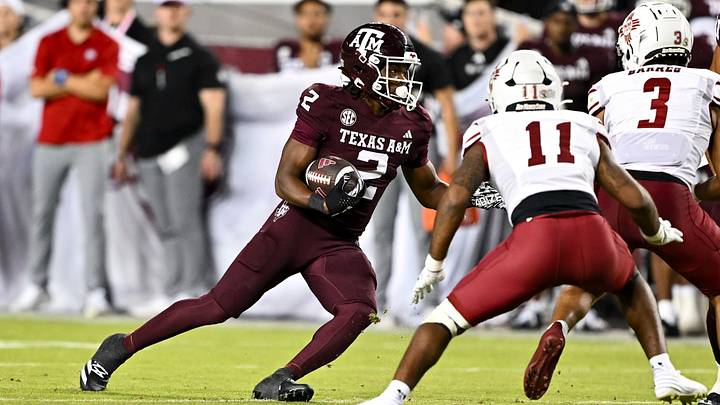 Texas A&M Aggies wide receiver Terry Bussey (2) runs the ball during the fourth quarter against the New Mexico State Aggies at Kyle Field. Texas A&M Aggies wide receiver Terry Bussey (2) runs the ball during the fourth quarter against the New Mexico State Aggies at Kyle Field.