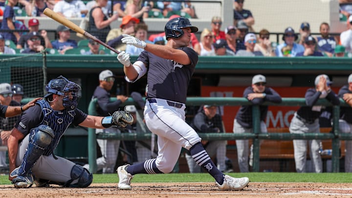 Mar 13, 2025; Lakeland, Florida, USA; Detroit Tigers outfielder Kerry Carpenter (30) watches his hit during the second inning against the New York Yankees at Publix Field at Joker Marchant Stadium. Mar 13, 2025; Lakeland, Florida, USA; Detroit Tigers outfielder Kerry Carpenter (30) watches his hit during the second inning against the New York Yankees at Publix Field at Joker Marchant Stadium.