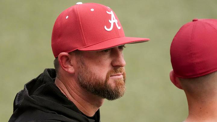 March 10, 2026; Tuscaloosa, AL, USA; Alabama head coach Rob Vaughn talks with another coach before the Crimson Tide’s game with Troy at Sewell-Thomas Stadium. March 10, 2026; Tuscaloosa, AL, USA; Alabama head coach Rob Vaughn talks with another coach before the Crimson Tide’s game with Troy at Sewell-Thomas Stadium.