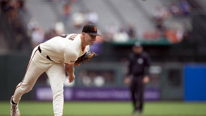 Sep 10, 2025; San Francisco, California, USA; San Francisco Giants starting pitcher Carson Seymour (77) delivers a pitch against the Arizona Diamondbacks during the first inning at Oracle Park. Mandatory Credit: D. Ross Cameron-Imagn Images