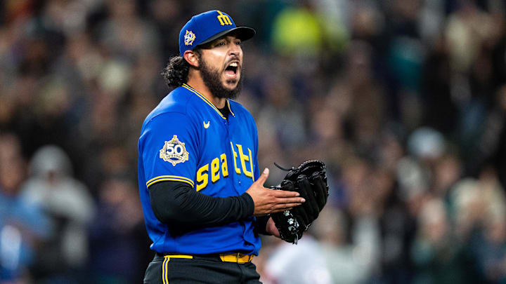 Andres Munoz (75) celebrates after a game against the Cleveland Guardians at T-Mobile Park. 