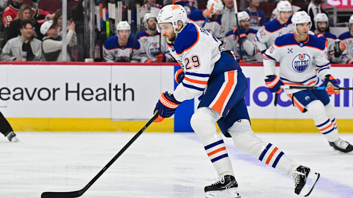 Feb 5, 2025; Chicago, Illinois, USA; Edmonton Oilers center Leon Draisaitl (29) skates with the puck against the Chicago Blackhawks during the first period at the United Center. Mandatory Credit: Daniel Bartel-Imagn Images