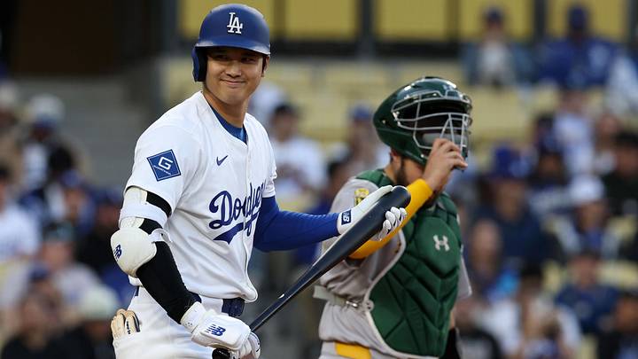 May 14, 2025; Los Angeles, California, USA; Los Angeles Dodgers two-way player Shohei Ohtani (17) reacts at the plate against the Athletics during the first inning at Dodger Stadium. Mandatory Credit: Jason Parkhurst-Imagn Images