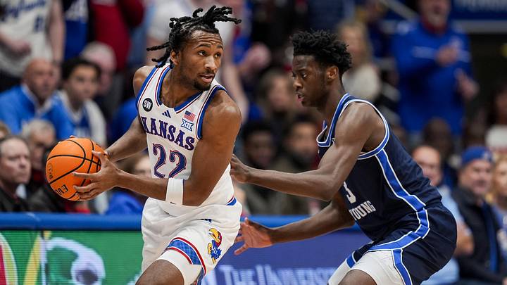 Jan 24, 2026; Columbia, Missouri, USA; Kansas Jayhawks guard Darryn Peterson (22) looks to pass against BYU Cougars forward AJ Dybantsa (3) during the first half at Mizzou Arena. Mandatory Credit: Jay Biggerstaff-Imagn Images Jan 24, 2026; Columbia, Missouri, USA; Kansas Jayhawks guard Darryn Peterson (22) looks to pass against BYU Cougars forward AJ Dybantsa (3) during the first half at Mizzou Arena. Mandatory Credit: Jay Biggerstaff-Imagn Images