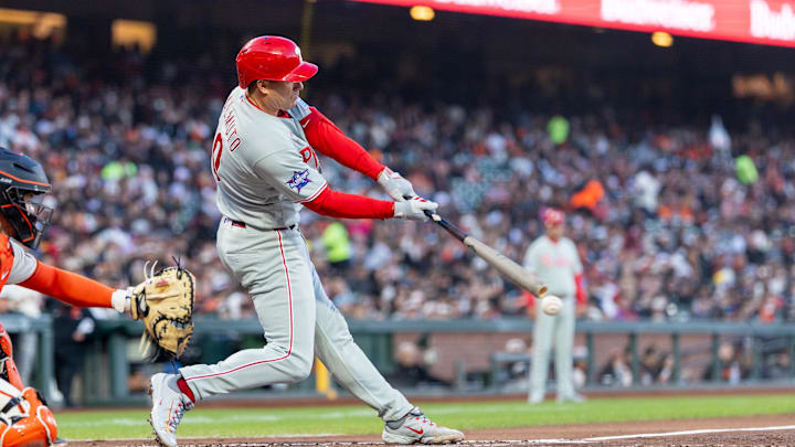 Apr 6, 2026; San Francisco, California, USA; Philadelphia Phillies catcher J.T. Realmuto (10) singles during the second inning San Francisco Giants at Oracle Park. Mandatory Credit: Bob Kupbens-Imagn Images