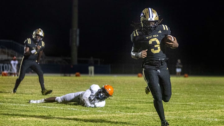 West Boca's Javian Mallory scores the winning touchdown to defeat Benjamin14-13 during their game on August 22, 2024 in Boca Raton, Florida.