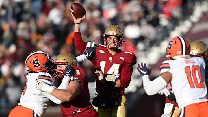 Nov 9, 2024; Chestnut Hill, Massachusetts, USA; Boston College Eagles quarterback Grayson James (14) throws against the Syracuse Orange during the second half at Alumni Stadium. Mandatory Credit: Brian Fluharty-Imagn Images