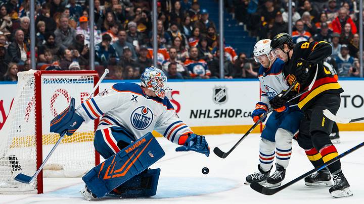 Jan 17, 2026; Vancouver, British Columbia, CAN; Edmonton Oilers goalie Tristan Jarry (35) watches as defenseman Spencer Stastney (24) battles with Vancouver Canucks forward Linus Karlsson (94) in the second period at Rogers Arena. Mandatory Credit: Bob Frid-Imagn Images Jan 17, 2026; Vancouver, British Columbia, CAN; Edmonton Oilers goalie Tristan Jarry (35) watches as defenseman Spencer Stastney (24) battles with Vancouver Canucks forward Linus Karlsson (94) in the second period at Rogers Arena. Mandatory Credit: Bob Frid-Imagn Images