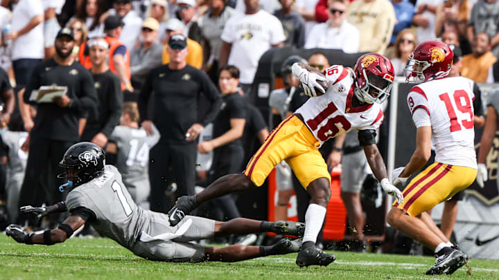 Sep 30, 2023; Boulder, Colorado, USA; USC Trojans wide receiver Tahj Washington (16) runs the ball