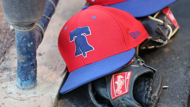 Mar 13, 2019; Tampa, FL, USA; A general view of Philadelphia Phillies hats laying in the dugout at George M. Steinbrenner Field. Mandatory Credit: Kim Klement-Imagn Images