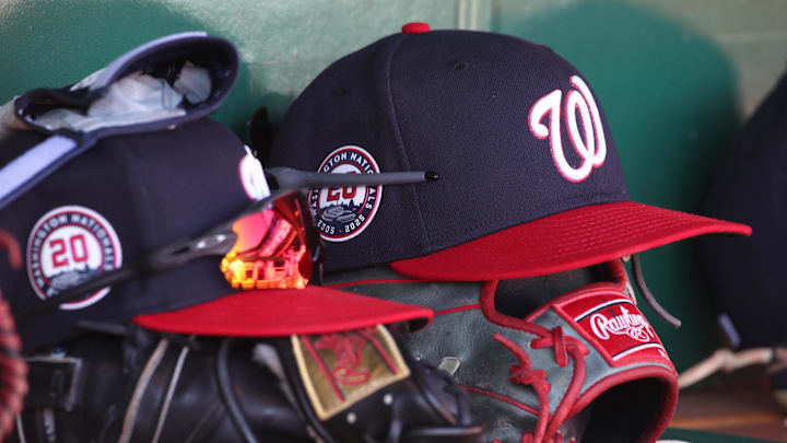 Apr 17, 2025; Pittsburgh, Pennsylvania, USA; Washington Nationals hats and gloves in the dugout against the Pittsburgh Pirates during the sixth inning at PNC Park. Apr 17, 2025; Pittsburgh, Pennsylvania, USA; Washington Nationals hats and gloves in the dugout against the Pittsburgh Pirates during the sixth inning at PNC Park.