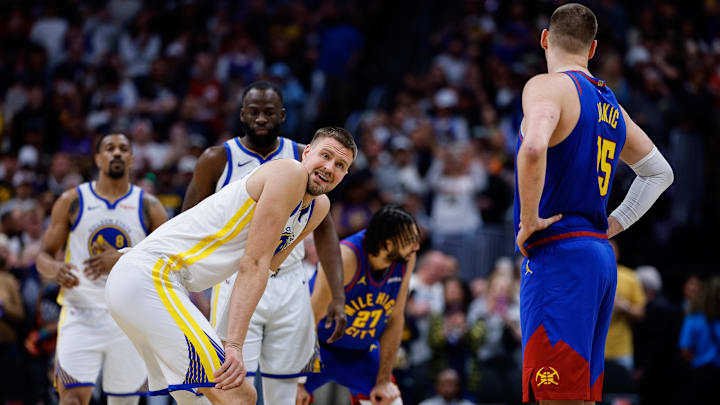 Mar 29, 2026; Denver, Colorado, USA; Golden State Warriors center Kristaps Porzingis (7) and Denver Nuggets center Nikola Jokic (15) before tip off at Ball Arena. Mandatory Credit: Isaiah J. Downing-Imagn Images Mar 29, 2026; Denver, Colorado, USA; Golden State Warriors center Kristaps Porzingis (7) and Denver Nuggets center Nikola Jokic (15) before tip off at Ball Arena. Mandatory Credit: Isaiah J. Downing-Imagn Images