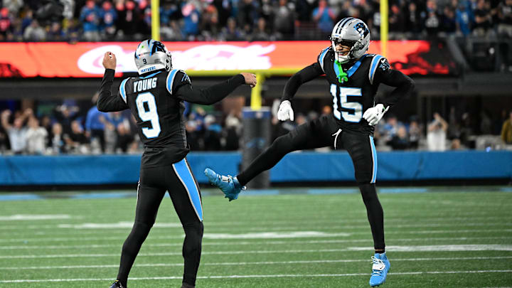 Jan 10, 2026; Charlotte, NC, USA; Carolina Panthers quarterback Bryce Young (9) and wide receiver Jimmy Horn Jr. (15) reacts in the fourth quarter in an NFC Wild Card Round game at Bank of America Stadium. Mandatory Credit: Bob Donnan-Imagn Images