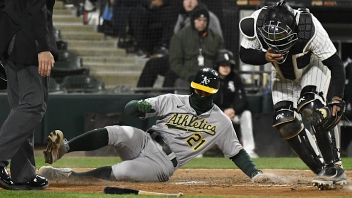 Athletics first baseman Tyler Soderstrom (21) scores against the Chicago White Sox at Rate Field. Athletics first baseman Tyler Soderstrom (21) scores against the Chicago White Sox at Rate Field.