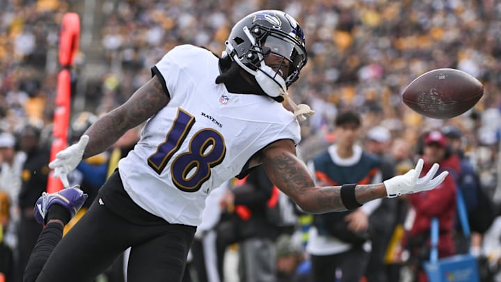 Nov 17, 2024; Pittsburgh, Pennsylvania, USA; Baltimore Ravens wide receiver Diontae Johnson (18) reaches for an incomplete pass against the Pittsburgh Steelers during the first quarter at Acrisure Stadium. Mandatory Credit: Barry Reeger-Imagn Images
