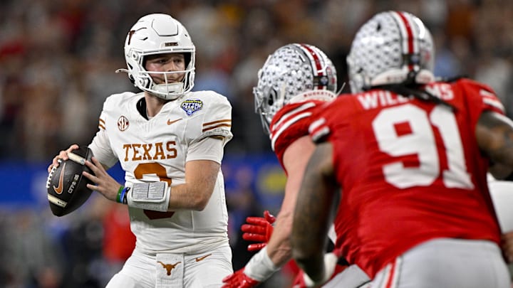 Jan 10, 2025; Arlington, TX, USA; Texas Longhorns quarterback Quinn Ewers (3) passes the ball during the game between the Texas Longhorns and the Ohio State Buckeyes at AT&T Stadium. Mandatory Credit: Jerome Miron-Imagn Images