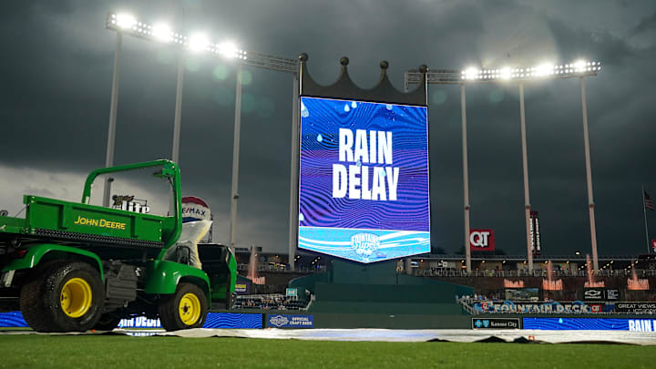 Jul 11, 2025; Kansas City, Missouri, USA; A general view of the field with tarp on during a rain delay prior to a game between the Kansas City Royals and New York Mets at Kauffman Stadium. Mandatory Credit: Denny Medley-Imagn Images