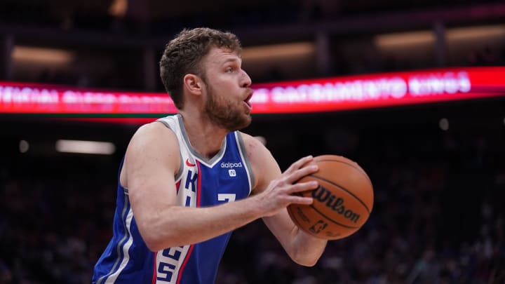 Apr 14, 2024; Sacramento, California, USA; Sacramento Kings forward Sasha Vezenkov (7) looks to shoot the ball against the Portland Trail Blazers in the fourth quarter at the Golden 1 Center. Mandatory Credit: Cary Edmondson-USA TODAY Sports