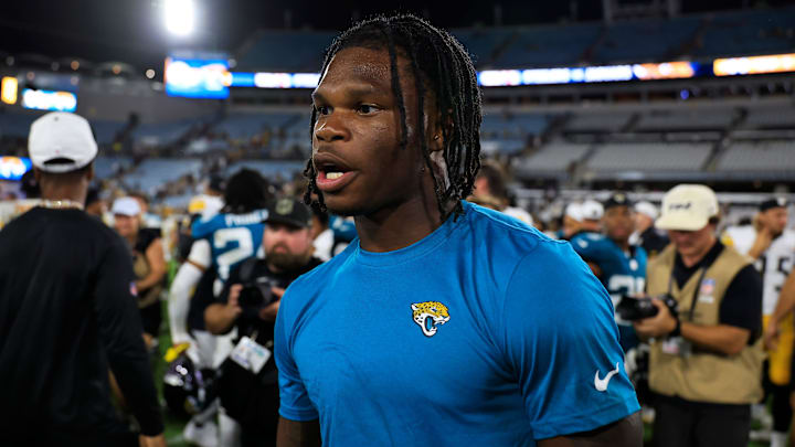Jacksonville Jaguars wide receiver Travis Hunter (12) walks on the field to greet players after the game of an NFL preseason matchup at EverBank Stadium, Saturday, Aug. 9, 2025 in Jacksonville, Fla. The Steelers defeated the Jaguars 31-25. [Corey Perrine/Florida Times-Union]