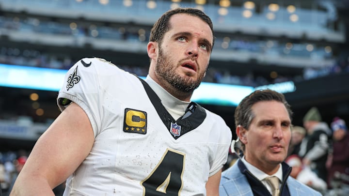 Dec 8, 2024; East Rutherford, New Jersey, USA; New Orleans Saints quarterback Derek Carr (4) walks off the field after field after an injury during the fourth quarter at MetLife Stadium. Mandatory Credit: Vincent Carchietta-Imagn Images