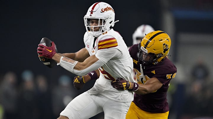 Dec 7, 2024; Arlington, TX, USA; Iowa State Cyclones wide receiver Jayden Higgins (9) and Arizona State Sun Devils defensive back Kyan McDonald (38) in action during the game between the Iowa State Cyclones and the Arizona State Sun Devils at AT&T Stadium. 