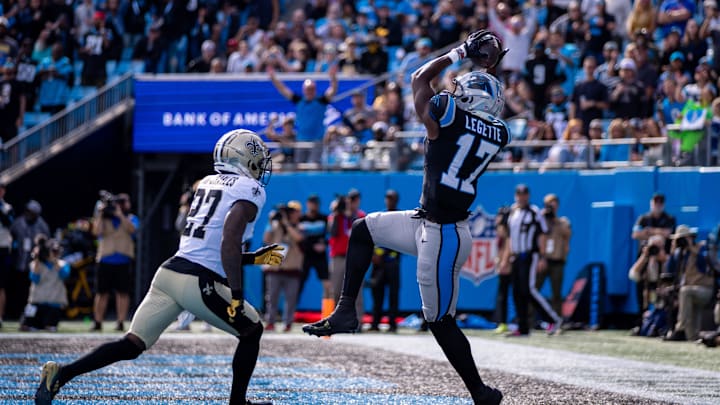 Nov 3, 2024; Charlotte, North Carolina, USA; Carolina Panthers wide receiver Xavier Legette (17) makes a catch over New Orleans Saints cornerback Shemar Jean-Charles (27) for a touchdown during the second quarter at Bank of America Stadium. Mandatory Credit: Scott Kinser-Imagn Images
