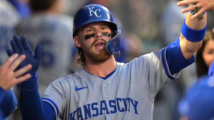 Sep 23, 2025; Anaheim, California, USA;  Kansas City Royals shortstop Bobby Witt Jr. (7) is greeted in the dugout after scoring during the first inning against the Los Angeles Angels at Angel Stadium. Mandatory Credit: Jayne Kamin-Oncea-Imagn Images