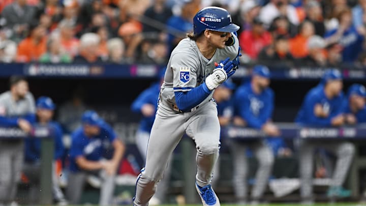 Oct 1, 2024; Baltimore, Maryland, USA; Kansas City Royals shortstop Bobby Witt Jr. (7) hits a RBI single at bat in the sixth inning in game one of the Wild Card round for the 2024 MLB Playoffs at Oriole Park at Camden Yards. Mandatory Credit: Tommy Gilligan-Imagn Images