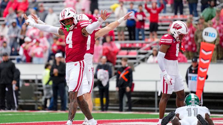 Sep 19, 2026; Madison, Wisconsin, USA;  Wisconsin Badgers safety Marvin Burks Jr. (4) reacts following a play during the fourth quarter against the Eastern Michigan Eagles at Camp Randall Stadium. Mandatory Credit: Jeff Hanisch-Imagn Images