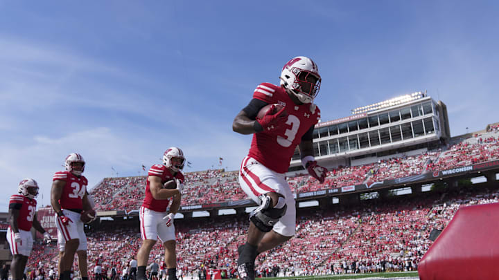 Sep 14, 2024; Madison, Wisconsin, USA; Wisconsin Badgers running back Tawee Walker (3) carries the football during warmups prior to the game against the Alabama Crimson Tide at Camp Randall Stadium. Mandatory Credit: Jeff Hanisch-Imagn Images Sep 14, 2024; Madison, Wisconsin, USA; Wisconsin Badgers running back Tawee Walker (3) carries the football during warmups prior to the game against the Alabama Crimson Tide at Camp Randall Stadium. Mandatory Credit: Jeff Hanisch-Imagn Images