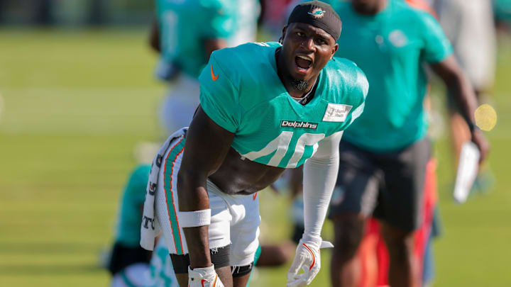 Miami Dolphins linebacker Willie Gay (40) reacts while stretching during training camp at Baptist Health Training Complex. Miami Dolphins linebacker Willie Gay (40) reacts while stretching during training camp at Baptist Health Training Complex.