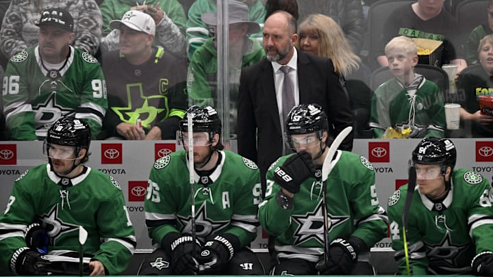Apr 12, 2025; Dallas, Texas, USA; Dallas Stars head coach Pete DeBoer  looks on during the first period against the Utah Hockey Club at the American Airlines Center. Mandatory Credit: Jerome Miron-Imagn Images