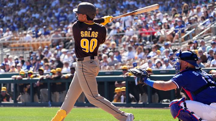 Feb 23, 2025; Phoenix, Arizona, USA; San Diego Padres catcher Ethan Salas (90) hits a double against the Los Angeles Dodgers during the second inning at Camelback Ranch-Glendale. Mandatory Credit: Joe Camporeale-Imagn Images Feb 23, 2025; Phoenix, Arizona, USA; San Diego Padres catcher Ethan Salas (90) hits a double against the Los Angeles Dodgers during the second inning at Camelback Ranch-Glendale. Mandatory Credit: Joe Camporeale-Imagn Images