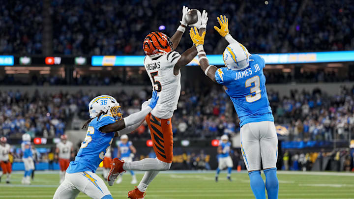 Nov 17, 2024; Inglewood, CA, USA; Los Angeles Chargers safety Derwin James Jr. (3) breaks up a deep pass to Cincinnati Bengals wide receiver Tee Higgins (5) as time expires in the fourth quarter at SoFi Stadium. Mandatory Credit: Sam Greene/USA TODAY Network via Imagn Images 
