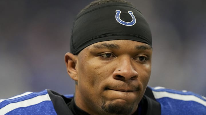 Nov 24, 2024; Indianapolis, Indiana, USA; Indianapolis Colts quarterback Anthony Richardson (5) walks off the field after losing to the Detroit Lions  at Lucas Oil Stadium. Mandatory Credit: Christine Tannous/USA TODAY Network via Imagn Images