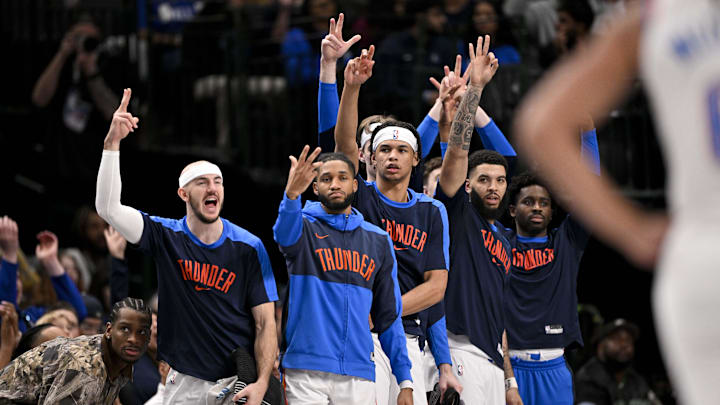 Jan 17, 2025; Dallas, Texas, USA; The Oklahoma City Thunder team bench celebrates during the second half against the Dallas Mavericks at the American Airlines Center. Mandatory Credit: Jerome Miron-Imagn Images