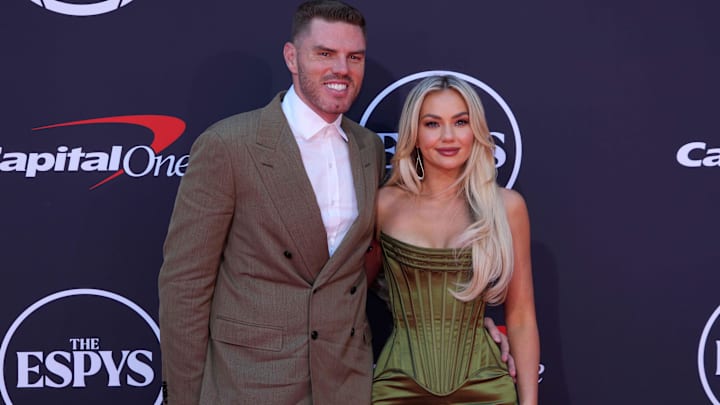 Los Angeles Dodgers first baseman Freddie Freeman (left) and wife Chelsea Freeman pose on the ESPYs red carpet at the Dolby Theatre.