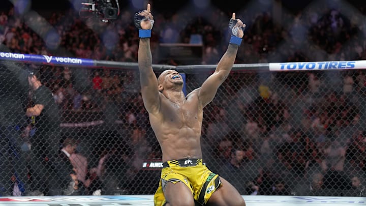 May 13, 2023; Charlotte, North Carolina, USA; Jailton Almeida (blue gloves) reacts after defeating