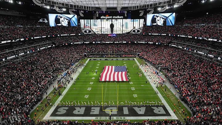 Nov 26, 2023; Paradise, Nevada, USA; A general view of a United States flag on the field during the national anthem at Allegiant Stadium before the game between the Las Vegas Raiders and the Kansas City Chiefs. Mandatory Credit: Kirby Lee-Imagn Images