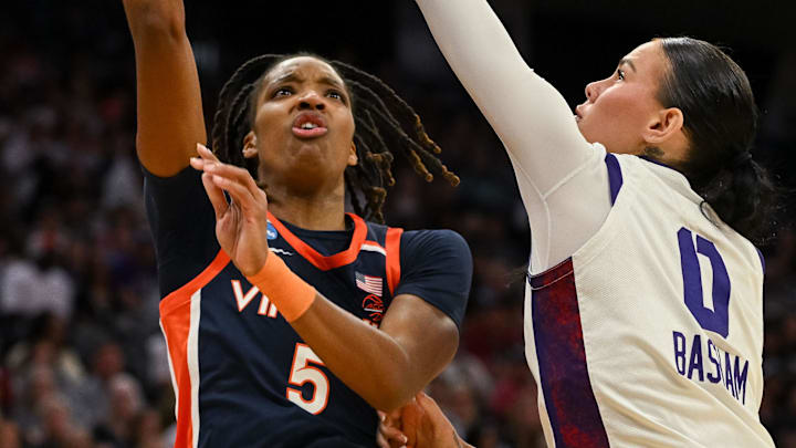 Virginia Cavaliers forward Sa'myah Smith (5) takes a shot over Texas Christian University Horned Frogs center Kennedy Basham (0) during the first quarter in the Sweet Sixteen game of the Sacramento Regional 4 of the women's 2026 NCAA Tournament at Golden 1 Center. 
