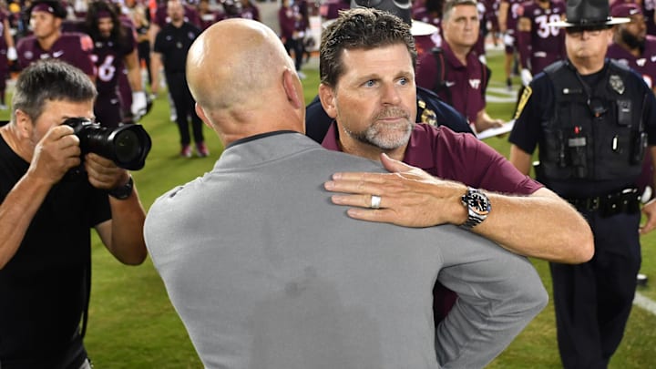 Sep 6, 2025; Blacksburg, Virginia, USA;  Vanderbilt Commodores head coach Clark Lea and Virginia Tech Hokies head coach Brent Pry after the game at Lane Stadium. Mandatory Credit: Brian Bishop-Imagn Images
