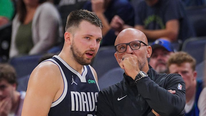 Oct 29, 2024; Minneapolis, Minnesota, USA; Dallas Mavericks guard Luka Doncic (left) and head coach Jason Kidd talk during the game against the Minnesota Timberwolves in the fourth quarter at Target Center. Mandatory Credit: Brad Rempel-Imagn Images Oct 29, 2024; Minneapolis, Minnesota, USA; Dallas Mavericks guard Luka Doncic (left) and head coach Jason Kidd talk during the game against the Minnesota Timberwolves in the fourth quarter at Target Center. Mandatory Credit: Brad Rempel-Imagn Images