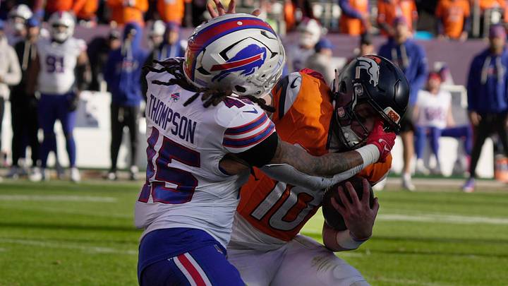 Buffalo Bills linebacker Shaq Thompson sacks Denver Broncos quarterback Bo Nix who kept the ball and was going to run with it during first half action at Empower FIeld at Mile High in Denver, Colorado on Jan. 17, 2026. Buffalo Bills linebacker Shaq Thompson sacks Denver Broncos quarterback Bo Nix who kept the ball and was going to run with it during first half action at Empower FIeld at Mile High in Denver, Colorado on Jan. 17, 2026.