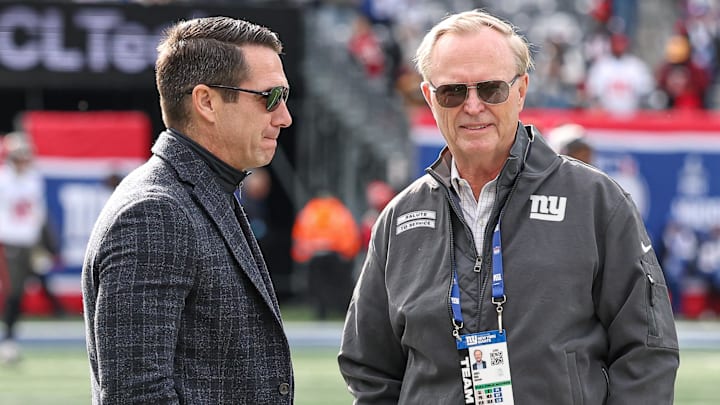 Nov 24, 2024; East Rutherford, New Jersey, USA; New York Giants owner John Mara, left, and New York Giants general manager Joe Schoen on the field before the game between the Giants and the Tampa Bay Buccaneers at MetLife Stadium. Mandatory Credit: Vincent Carchietta-Imagn Images