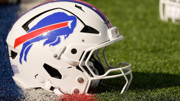 A Buffalo Bills helmet sits on a yard marker during stretching before the Return of the Blue & Red practice at Highmark Stadium in Orchard Park on Aug.1, 2025.
