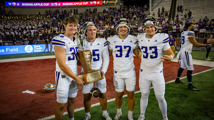 Next kicker Ethan Moczulski (37) is shown with punter Trevor Allen (38), kicker Grady Gross and snapper Ryan Kean (33).