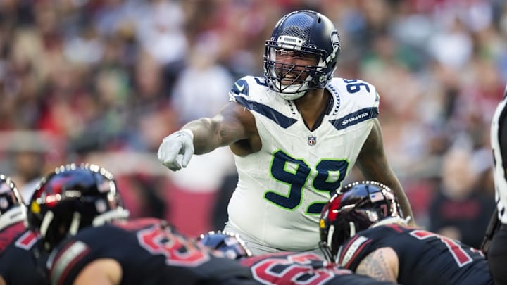 Dec 8, 2024; Glendale, Arizona, USA; Seattle Seahawks defensive end Leonard Williams (99) against the Arizona Cardinals at State Farm Stadium. 