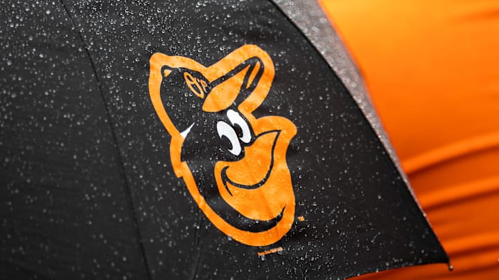 Aug 22, 2021; Baltimore, Maryland, USA; A Baltimore Orioles logo is seen on an umbrella during the game between the Baltimore Orioles and the Atlanta Braves at Oriole Park at Camden Yards. Mandatory Credit: Scott Taetsch-Imagn Images