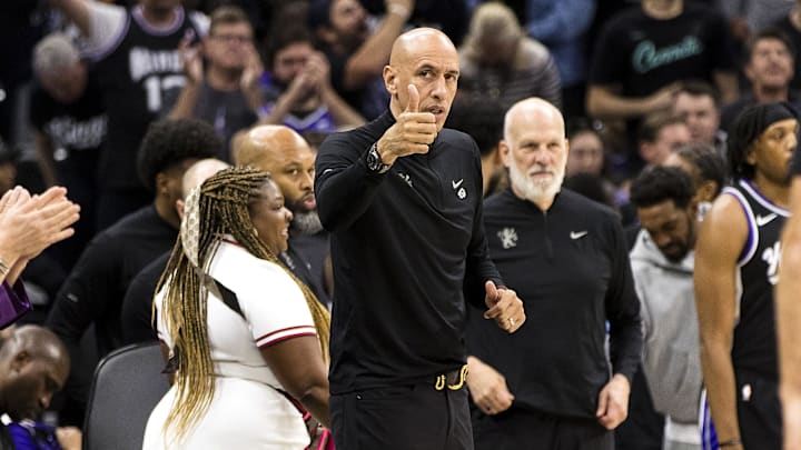 Apr 13, 2025; Sacramento, California, USA;  Sacramento Kings interim head coach Doug Christie gestures to the Phoenix Suns bench after the game at Golden 1 Center. Mandatory Credit: John Hefti-Imagn Images